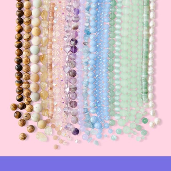 brown, purple, blue and green rows of assorted beads